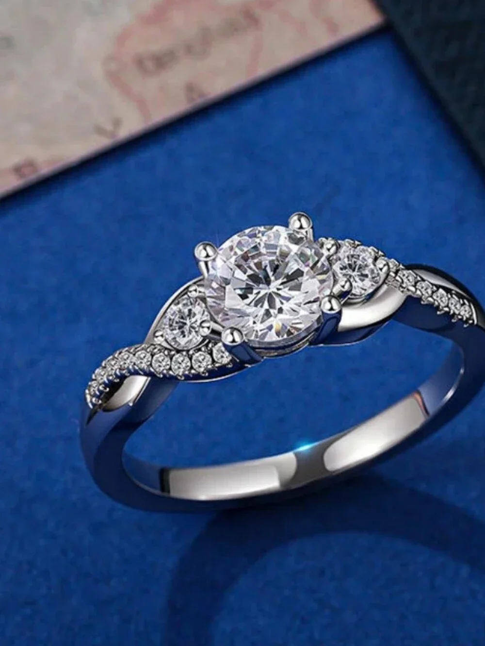 925 Jeulia Classic Twist Custom Round Three Stone Ring & Eternity Wedding Band
